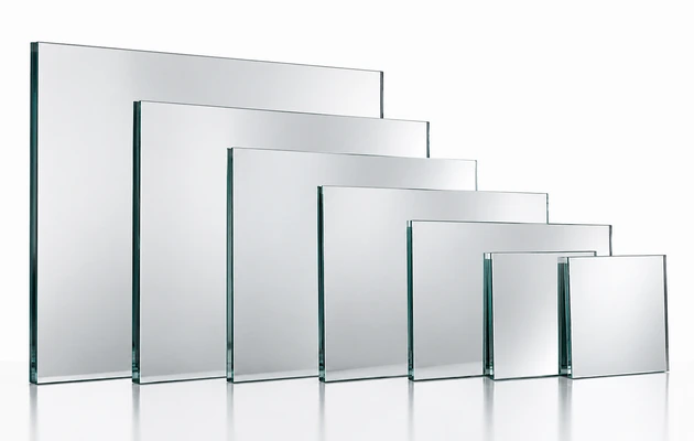 Custom-cut mirror glass panels displayed in multiple sizes with polished edges.